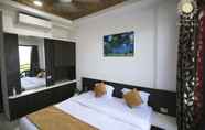 Bedroom 2 Hotel Relax Inn