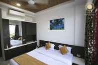 Bedroom Hotel Relax Inn