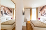 ห้องนอน Riva City Rooms