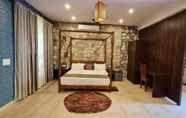 Bedroom 5 1B-Wild Heritage-101 N By bnbmehomes