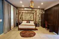 Bedroom 1B-Wild Heritage-101 N By bnbmehomes