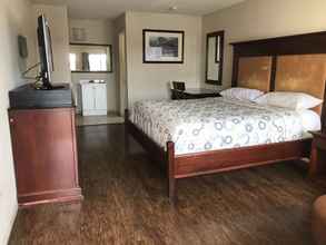 Bedroom 4 Great Western Inn & Suites - Saginaw