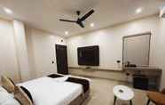 Bedroom 4 Radha Residency by ShriGo Hotels