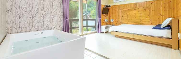 ห้องนอน Gapyeong Maronie Spa Pension