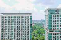 Bangunan Comfort Studio Apartment At Woodland Park Residence