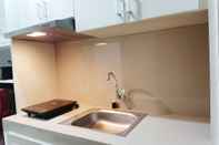 ห้องนอน Homey And Tidy Studio Apartment At Vida View Makassar