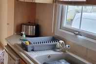 In-room Bathroom 8 Berth Caravan Direct Beach Access