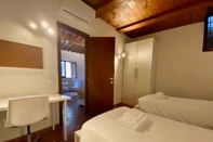 Bilik Tidur Vinegia Apartment in Firenze