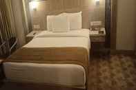 ห้องนอน Hotel Suruli Pallazzio