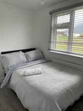 Bedroom 4 Castle View Chalet by Clonlum Cottages