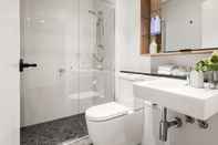 In-room Bathroom Cinema Suites Apartments by Urban Rest