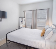 Bedroom 4 Elevate Your Stay at 3br/2.5ba Downtown Gem!