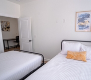 Bedroom 5 Elevate Your Stay at 3br/2.5ba Downtown Gem!