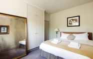 Bedroom 5 Exquisite East Acton Home Close to Shepherds Bush by Underthedoormat