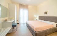 Kamar Tidur 2 Porta Maggiore Deluxe Center City Rooms