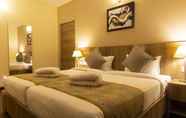 Bedroom 4 Starlit Suites Tirupati LLP