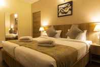 Bedroom Starlit Suites Tirupati LLP