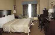 Kamar Tidur 7 Bayou Inn & Suites