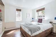 Kamar Tidur Bright and Stylish Apartment in Trendy Islington by Underthedoormat