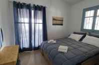 Bedroom A Beach Front Chalet