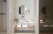 In-room Bathroom 6 Arco Solium Suites Milos Superior Suite