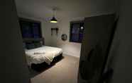 Bedroom 2 Impeccable 2-bed Apartment in Grays, London