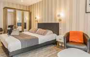 Bedroom 4 Hotel SPA Piscine le Petit Castel