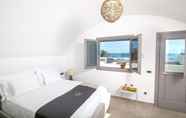 Bedroom 2 Aegean Melody Suites Santorini Deluxe Suite With Outdoor Private Heated Jacuzzi