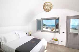 Bedroom 4 Aegean Melody Suites Santorini Deluxe Suite With Outdoor Private Heated Jacuzzi