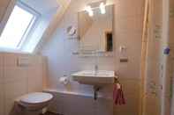 ห้องน้ำภายในห้อง Ferienhaus Mien Huske