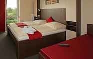 Bedroom 2 Arena Hotel