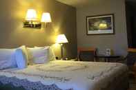 Kamar Tidur Whispering Sands Motel