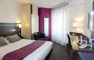 Bedroom 7 Brit Hotel Belfort Centre - Le Boreal