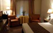 Phòng ngủ 4 Americourt Hotel