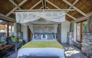 Kamar Tidur 4 Mosaic Lagoon Lodge