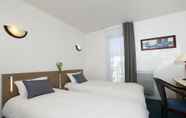 Bedroom 7 Appart'City  Confort Cherbourg