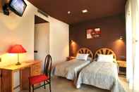 ห้องนอน Hotel Navarro