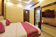 Bedroom Hotel Aman International at New Delhi Station