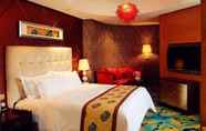 Kamar Tidur 4 Days Hotel & Suites by Wyndham Hengan Chongqing