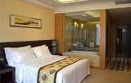 Kamar Tidur 7 Days Hotel & Suites by Wyndham Hengan Chongqing