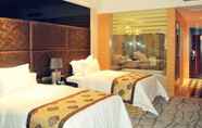 ห้องนอน 5 Days Hotel & Suites by Wyndham Hengan Chongqing