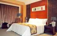 Kamar Tidur 6 Days Hotel & Suites by Wyndham Hengan Chongqing