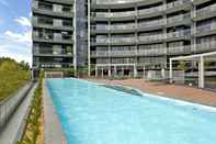 Kolam Renang AAC Apartments - Manhattan