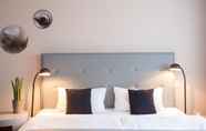 Kamar Tidur 4 The Grey Hotel