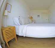 Kamar Tidur 2 Blue Buddha Beach Rooms & Suites