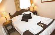 Kamar Tidur 5 High Corner Inn