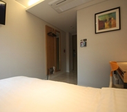 Kamar Tidur 6 I.T.W. Hotel