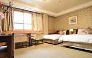 Kamar Tidur 6 Hotel Samwon Plaza