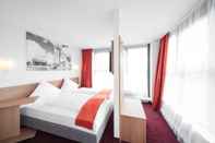 Bedroom McDreams Hotel Leipzig-City