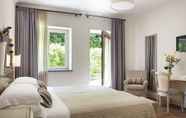 Kamar Tidur 3 Altarocca Wine Resort Adults Only